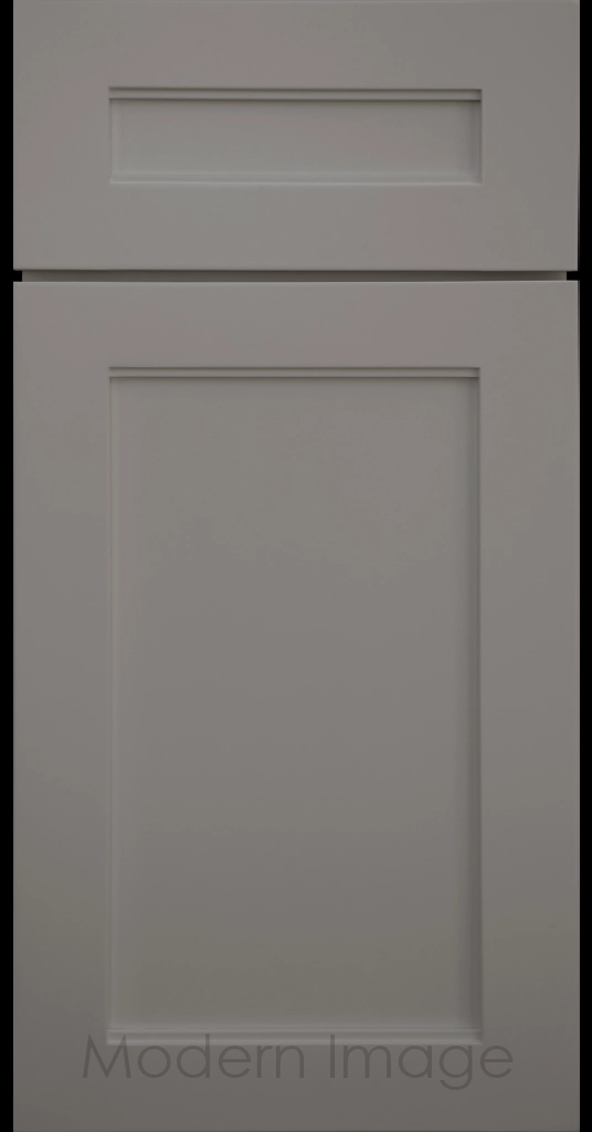 Destin shaker cabinet in 
			Grayfeaturing ledge detail and vertical joints around a recessed center panel.